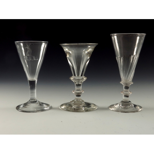 1803 - 3 GEORGIAN GLASSES, A WINE GLASS WITH DOUBLE KNOP STEM, ANOTHER WITH ARMORIAL ENGRAVING AND ONE OTHE... 