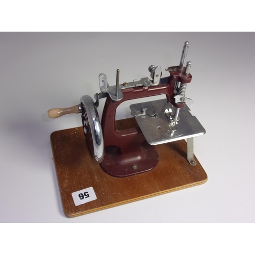 56 - SMALL CHILDS SEWING MACHINE