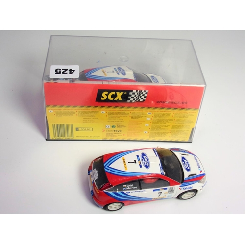 425 - SCX BOXED 1-32 SCALE RACING SYSTEM RALLY CAR NUMBER 7 MCRAE AND GRIST REF 60410 TOGETHER WITH AN UNB... 