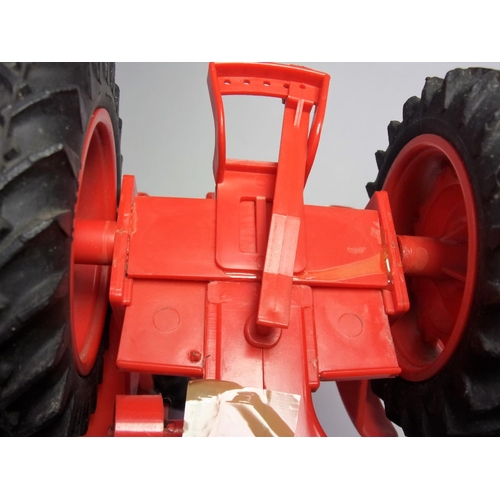 462 - PLASTIC NUFFIELD TRACTOR BELIEVED TO BE IN THE TOP OF A BOX OF A NUFFIELD UNIVERSAL MODEL BOX WHICH ... 