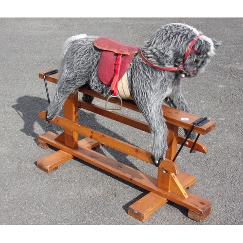 49 - A CHILDS ROCKING HORSE, IN GOOD CONDITION