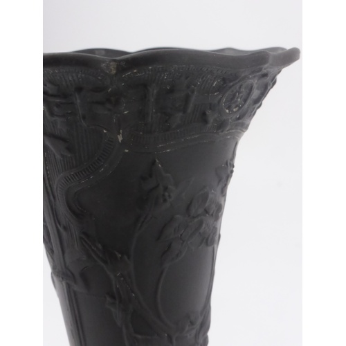 707 - EARLY WEDGWOOD BLACK BASALT TRUMPET VASE WITH RELIEF FLORAL DECORATION AND FLUTED RIM APPROX 25 cm A... 