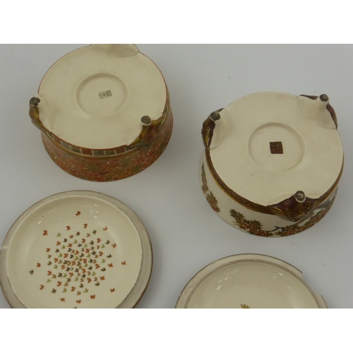 734 - 2 JAPANESE SATSUMA TYPE CIRCULAR POTS, EACH WITH A COVER AND RAISED ON 3 FEET APPROX 10 cm DIAMETER