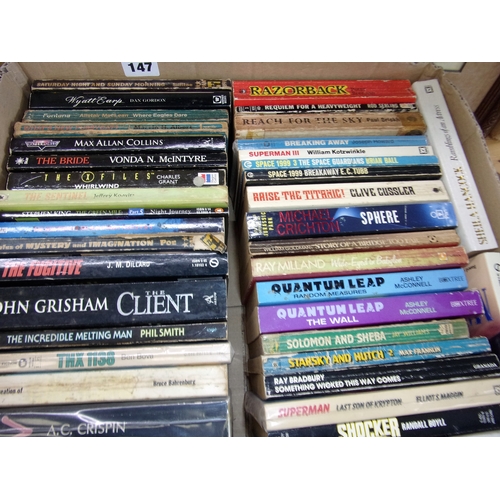 147 - 2 TRAYS OF MOVIE AND TV RELATED PAPERBACK SOME SCI-FI INCLUDING 2001 A SPACE ODYSSEY RED HEAT FUGITI... 