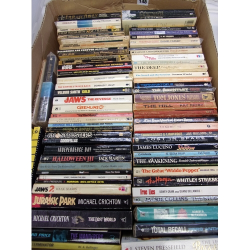 148 - TRAY OF BOOKS SCI-FI AND TV RELATED INCLUDING JAWS SEVERAL JAMES BOND TITLES LOST IN SPACE ETC APPRO... 