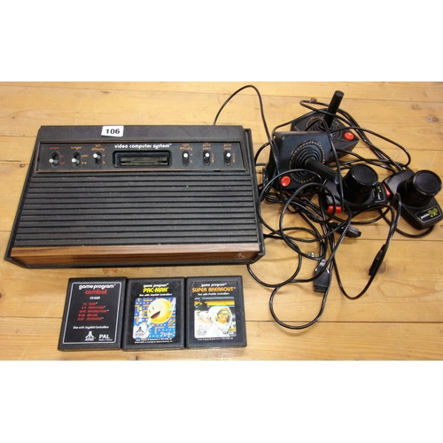 106 - EARLY VIDEO COMPUTER SYSTEM FOR GAMES ATARI CX-2600U WITH CONTROLLERS AND 3 GAME CONSOLES PACMAN SUP... 