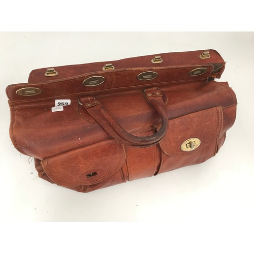 253 - A CAMEL SKIN BAG