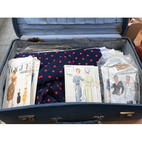 254 - SUITCASE CONTAINING VINTAGE SEWING PATTERNS AND FABRICS