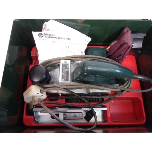 65 - METABO POWER PLANER TOGETHER WITH A METABO ANGLE GRINDER/DISK CUTTER BOTH IN CASES