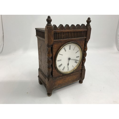 872 - OAK CASED MANTLE CLOCK WITH WHITE ENAMELLED DIAL