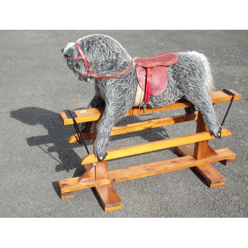 202 - A CHILDS ROCKING HORSE, IN GOOD CONDITION