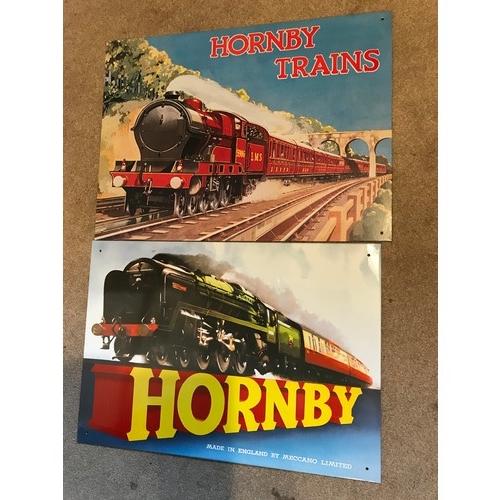 17 - TWO MODERN REPRO ADVERTISING SIGNS HORNBY APPROX 40CM X 28 CM AND HORNBY TRAINS 41 CM X 31 CM. PLUS ... 