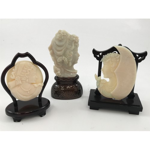 1972 - 3 OPAL CARVINGS EACH DEPICTING A EUROPEAN HEAD TALLEST APPROX 9 cm AND ALL 3 ON A HARDWOOD PRESENTAT... 