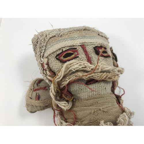 1710 - 2 ETHNIC TRIBAL STRAW FILLED CLOTH DOLLS ONE DEPICTING A FEMALE APPROX 25 cm THE OTHER A VERY UNUSUA... 