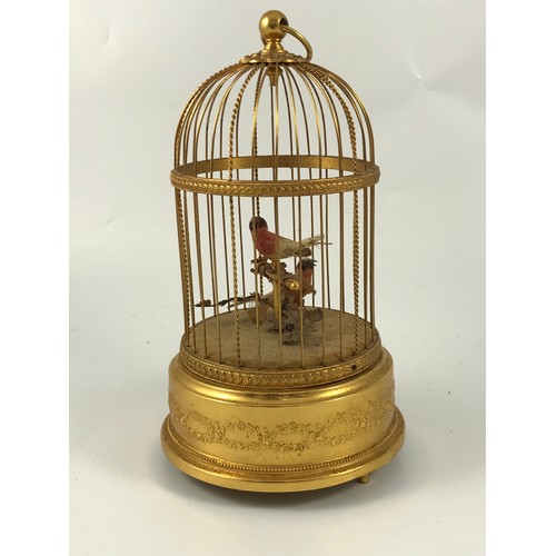 1819 - SWISS GILT METAL BIRD IN A CAGE AUTOMATON APPROX. 29.5cm