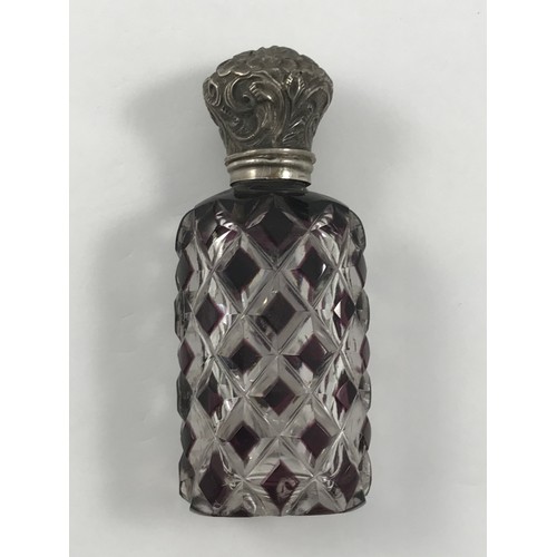 1958 - VICTORIAN CUT GLASS PERFUME BOTTLE WITH EMBOSSED SILVER LID