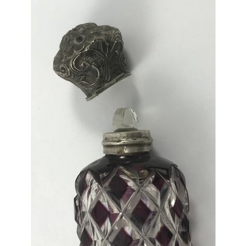 1958 - VICTORIAN CUT GLASS PERFUME BOTTLE WITH EMBOSSED SILVER LID