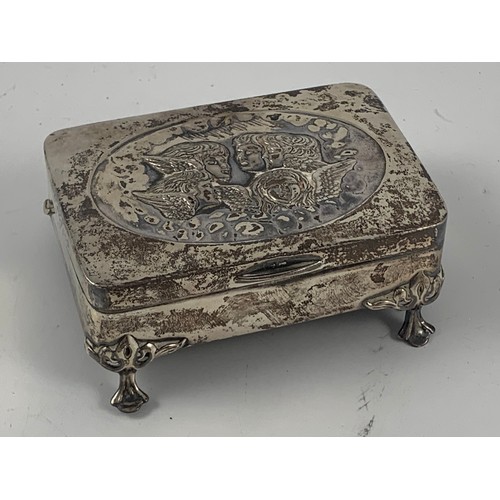 1856 - SILVER TRINKET BOX WITH EMBOSSED ANGEL DECORATION TO THE HINGED LID