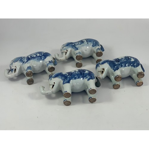 1769 - 4 ORIENTAL BLUE AND WHITE ELEPHANT FIGURES POSSIBLY 18TH OR EARLY 19TH CENTURY SOME AF, each approx.... 