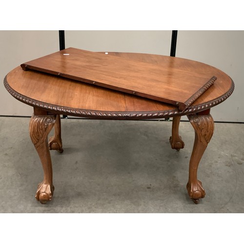 464 - WIND OUT DINING TABLE WITH HEAVY CABRIOLE LEGS, BALL AND CLAW FEET AND CASTERS