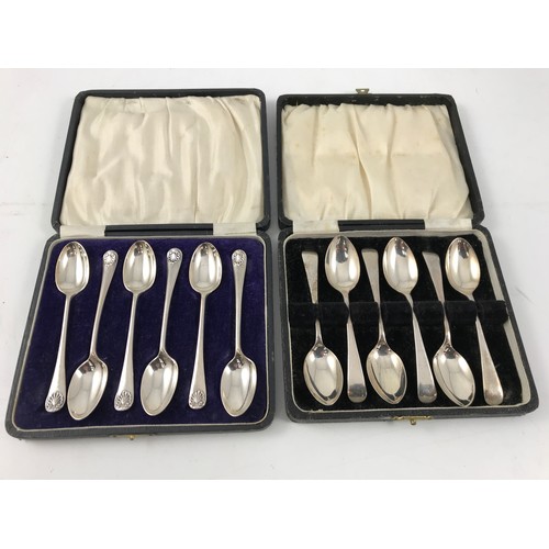 1928 - 2 CASED SETS OF SILVER SPOONS