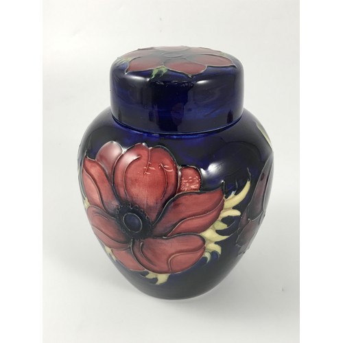 1743 - MOORCROFT POTTERY GINGER JAR WITH TUBE LINED ANEMONE PATTERN ON DARK BLUE GROUND SIGNED MOORCROFT BA... 