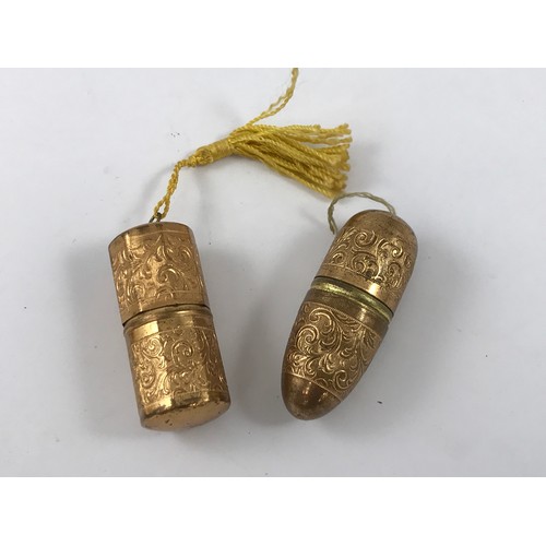 713 - 2 GILT METAL BOBBIN CASES