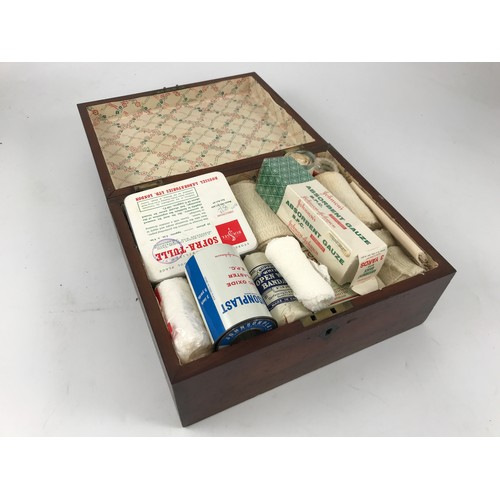 922 - MAHOGANY BOX AND FIRST AID CONTENTS