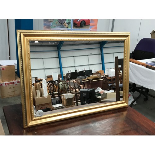 632 - GILT FRAMED MIRROR, approx. 106 x 76 cm