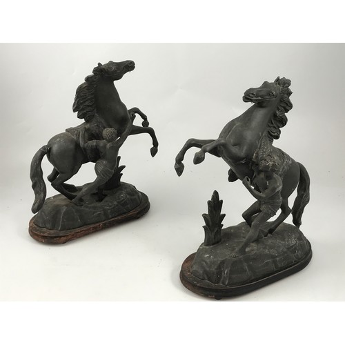 720 - PAIR OF SPELTER FIGURES DEPICTING REARING HORSES AF