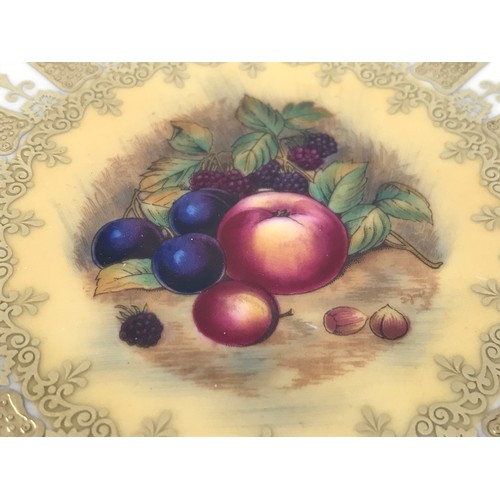 1752 - AYNSLEY CABINET PLATE WITH CENTRAL PANEL DECORATED WITH STILL LIFE FRUIT SIGNED D.JONES WITHIN AN EM... 