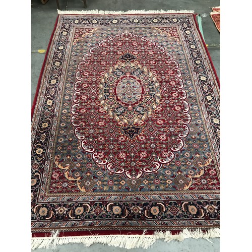 481 - RED AND BLUE GROUND CARPET, approx. 230 x 168 cm