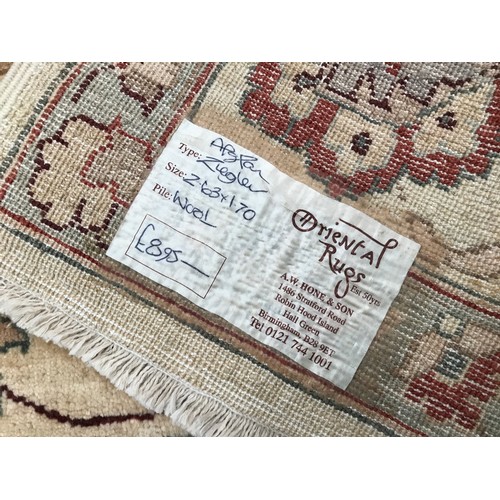 485 - GOOD QUALITY BEIGE GROUND AFGHAN ZEGLER CARPET, APPROX. 263 X 170 cm WITH PRICE LABEL £895