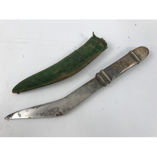 1643 - INDIAN JAMBIYA DAGGER, BLADE APPROX. 17.5 cm, DECORATED WHITE METAL HANDLE, GREEN CLOTH COVERED WOOD... 