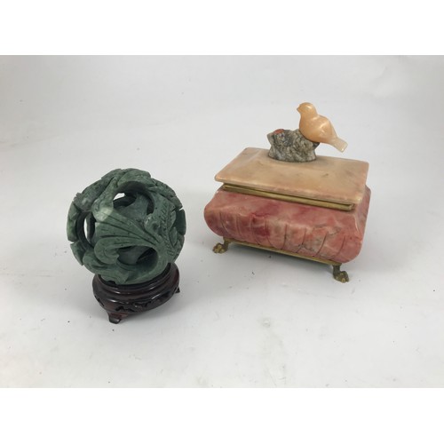 723 - ONYX BOX AND COVER WITH BIRD FINIAL AND A SOAPSTONE PUZZLE BALL WITH HARDWOOD STAND