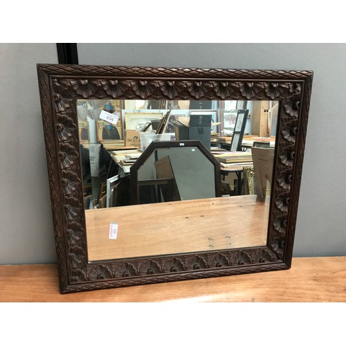 634 - CARVED WOOD FRAMED MIRROR