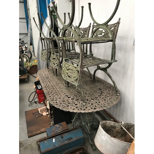 55 - HEAVY GOOD QUALITY CAST STEEL OUTDOOR TABLE AND 6 CHAIRS