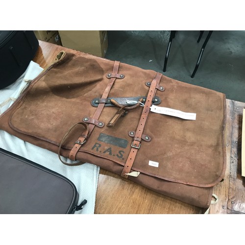 1620 - OFFICER’S CANVAS & LEATHER SUIT CARRIER WITH CARRYING HANDLE MARKED “R. A. S.”