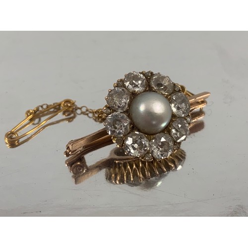 2176 - YELLOW GOLD BROOCH WITH DAISY CUT CENTRAL PEARL WITHIN A RING OF 8 OLD CUT DIAMONDS EACH OF THE DIAM... 