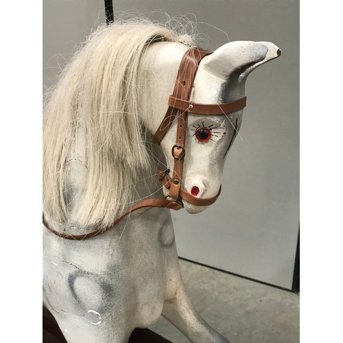 2 - LARGE WHITE ROCKING HORSE WITH LEATHER STYLE SADDLE, HEAVY HINGES, MANE AND TAIL APPROX. 46 INCHES H... 