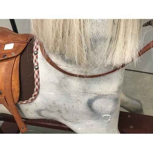 2 - LARGE WHITE ROCKING HORSE WITH LEATHER STYLE SADDLE, HEAVY HINGES, MANE AND TAIL APPROX. 46 INCHES H... 