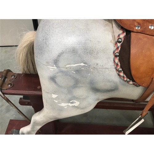 2 - LARGE WHITE ROCKING HORSE WITH LEATHER STYLE SADDLE, HEAVY HINGES, MANE AND TAIL APPROX. 46 INCHES H... 