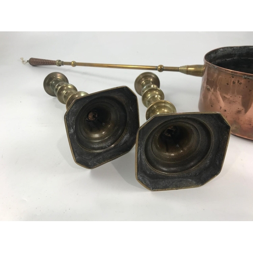 1091 - PAIR OF OLD BRASS CANDLESTICKS WITH PUSHERS AND A COPPER PAN