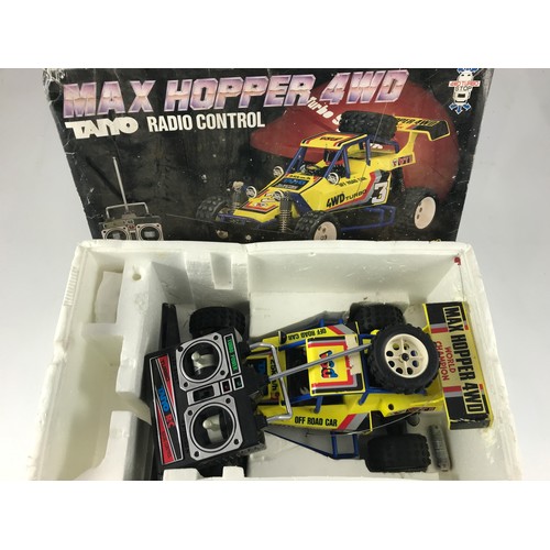 210 - 2 BOXED MAX HOPPER 4WD TAYIO RADIO CONTROLLED BUGGY CARS