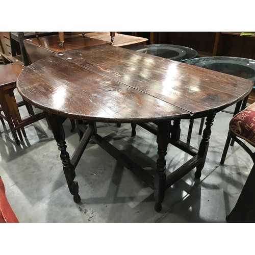 259 - ANTIQUE OAK GATE LEG DINING TABLE