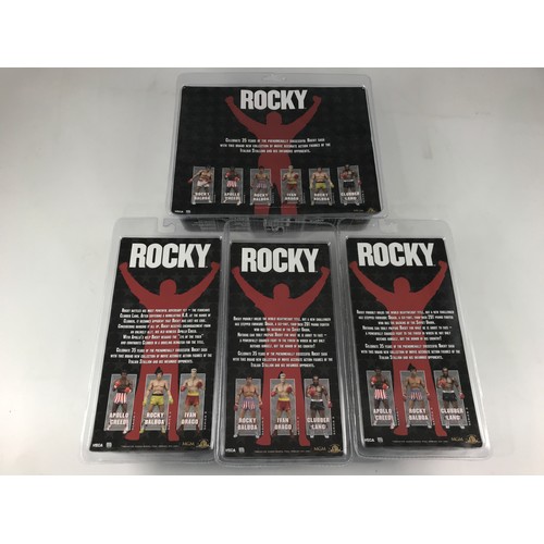 216 - 4 BUBBLE PACKED ROCKY SERIES CHARACTERS INCLUDING ROCKY BALBOA AND APOLLO CREED, CLUBBER LANG, ROCKY... 