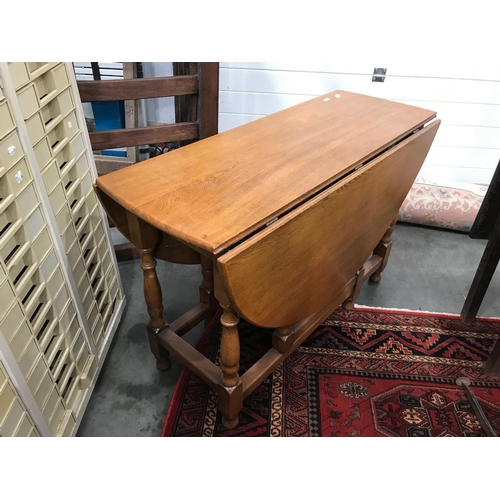 338 - DROP LEAF DINING TABLE