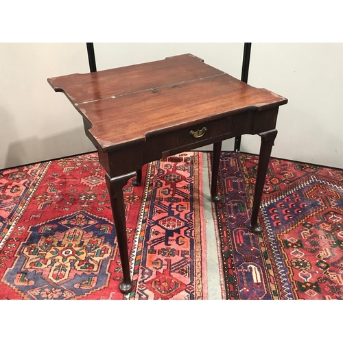 341 - MAHOGANY FOLD OVER TEA TABLE WITH FRIEZE DRAWERS