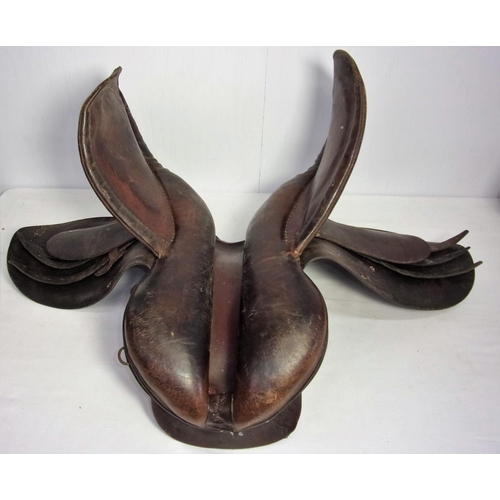 584 - OLD LEATHER SADDLE