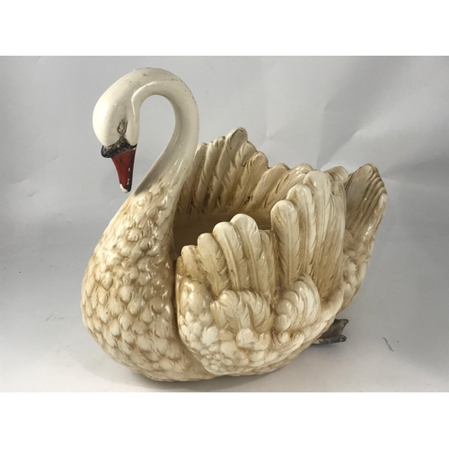 821 - LARGE GLAZED PORCELAIN JARDINIERE IN THE FORM OF A SWAN, 42h X 45 cm